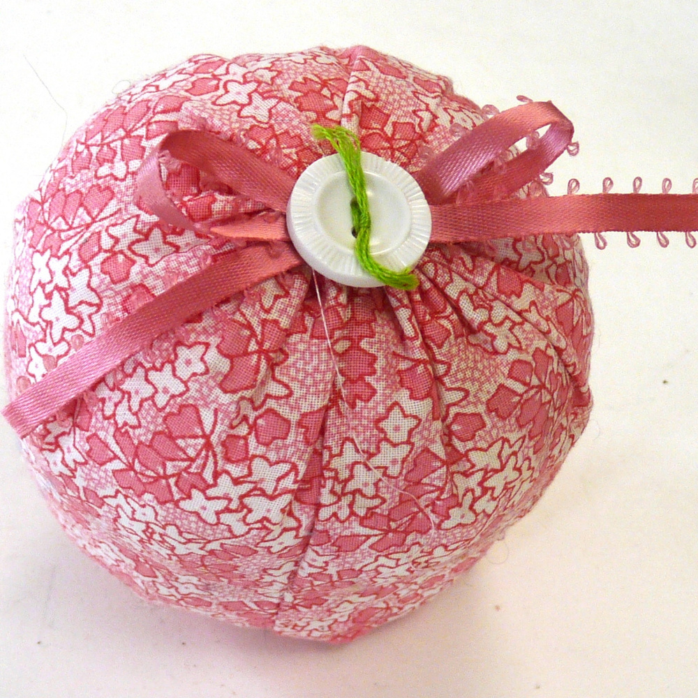 Hand worked sewing pin cushion pink calico buttons